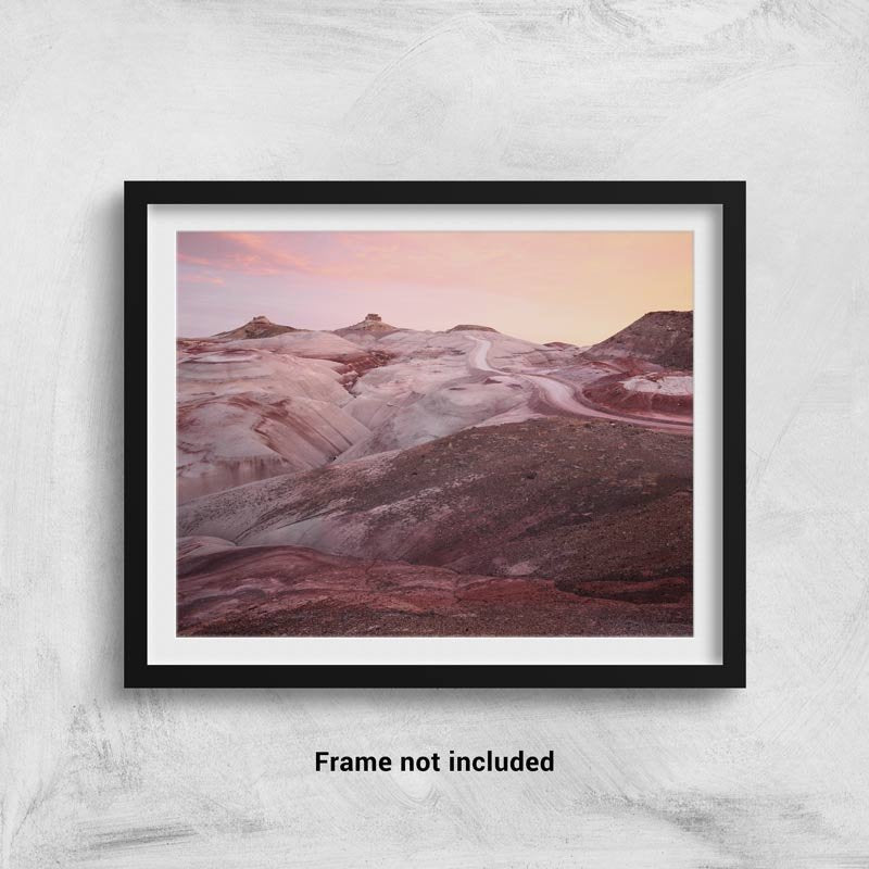 The Bentonite hills of Utah at sunrise framed on a wall