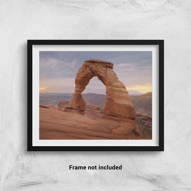 The Delicate Arch at sunrise framed on a wall